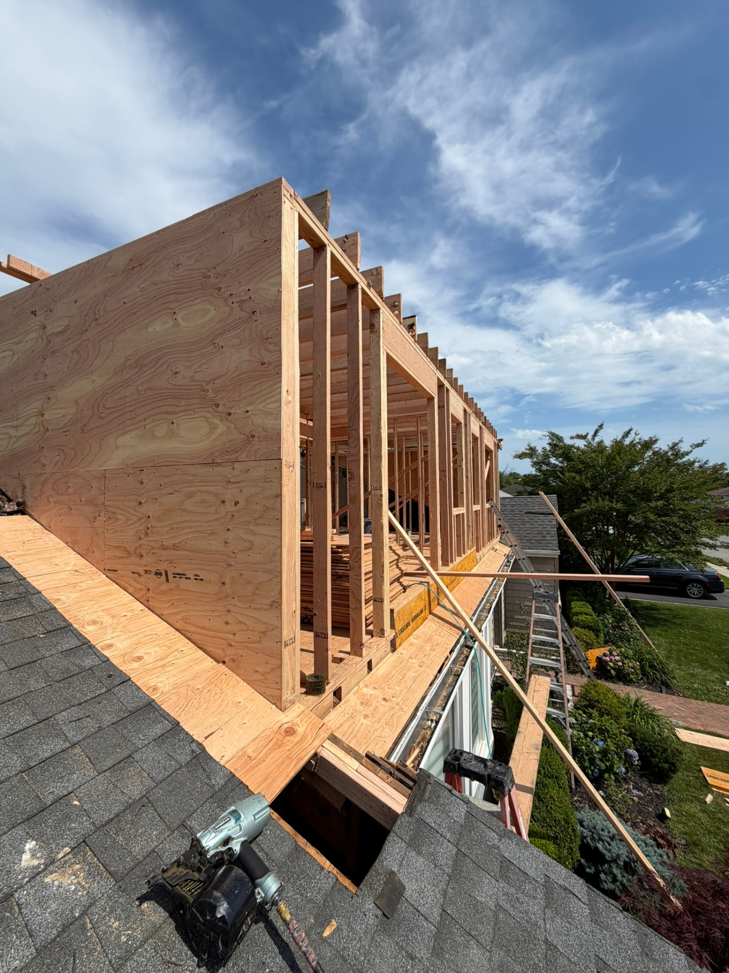 New second floor framed and sheathed during a dormer build