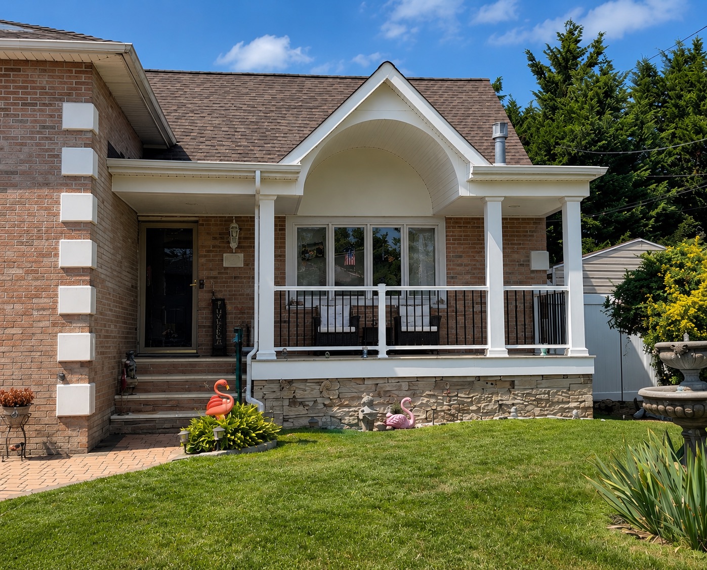 Brick home with new covered front porch and stone skirting