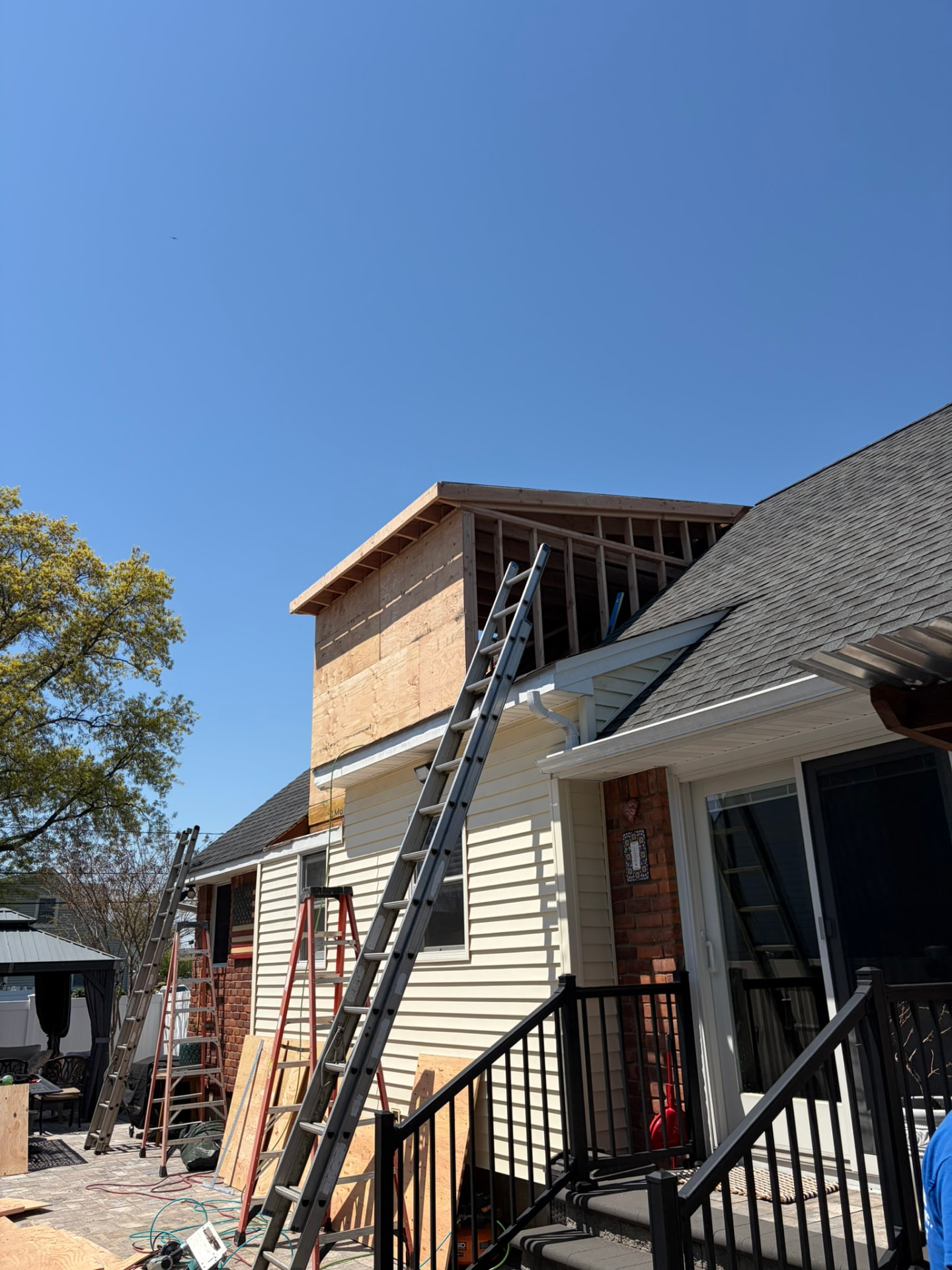 Second-story addition under construction above a ranch home